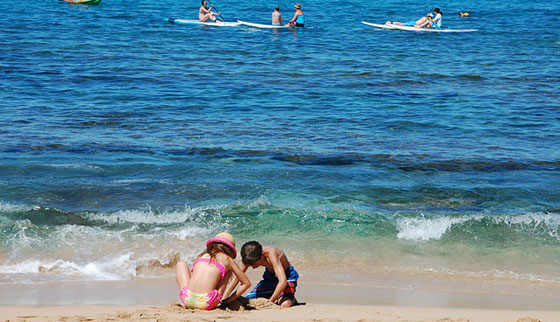 minor-children-playing-at-the-beach